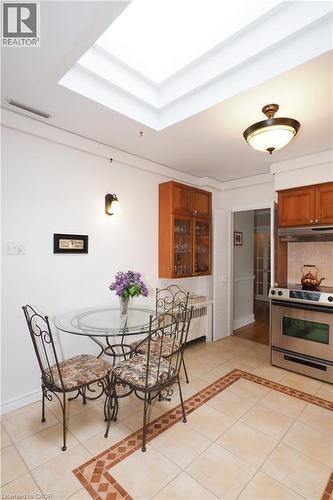 Kitchen space featuring a prominent ceiling skylight and recessed lighting - 2023 Coronation Boulevard, Cambridge, ON - Indoor Photo Showing Dining Room