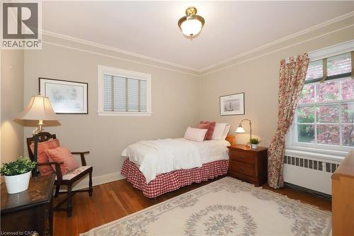 Interior room with hardwood flooring and light-toned walls - 2023 Coronation Boulevard, Cambridge, ON - Indoor Photo Showing Bedroom