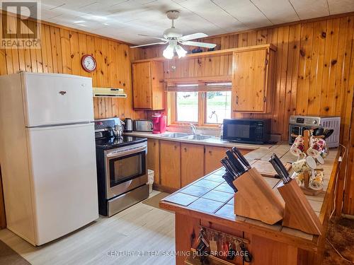 69 Main Street, Timiskaming (Tim - Latchford), ON - Indoor Photo Showing Kitchen With Double Sink