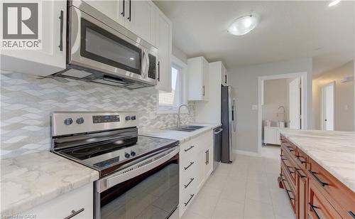 51 Coach Hill Drive, Kitchener, ON - Indoor Photo Showing Kitchen With Upgraded Kitchen
