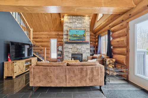 Living Room - 472 Ch. Champigny, Larouche, QC - Indoor With Fireplace