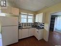 10 Railway Avenue, Redvers, SK  - Indoor Photo Showing Kitchen With Double Sink 