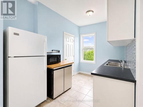 406 Jackson Street W, Hamilton, ON - Indoor Photo Showing Kitchen With Double Sink