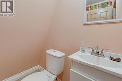 Upstairs half bathroom - 
