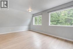 Upstairs Flex space.  Personal items digitally removed. - 