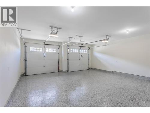 Double Car Garage - 2150 Montenegro Drive, Kelowna, BC - Indoor Photo Showing Garage