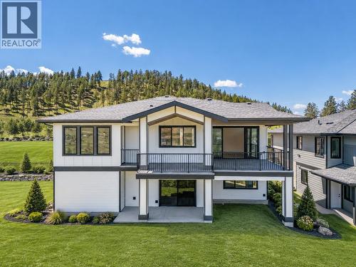 *Virtually Landscaped* - 2150 Montenegro Drive, Kelowna, BC - Outdoor With Deck Patio Veranda With Facade