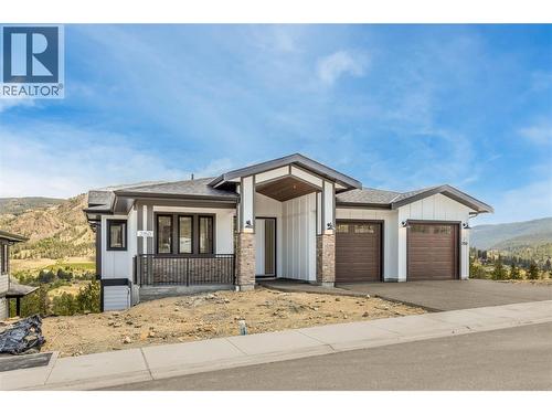 2150 Montenegro Drive, Kelowna, BC - Outdoor With Facade