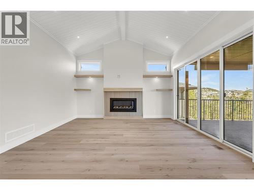 2150 Montenegro Drive, Kelowna, BC - Indoor With Fireplace