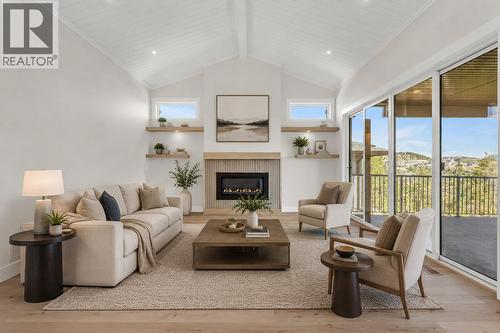 Living Room *Virtually Staged* - 2150 Montenegro Drive, Kelowna, BC - Indoor Photo Showing Living Room With Fireplace