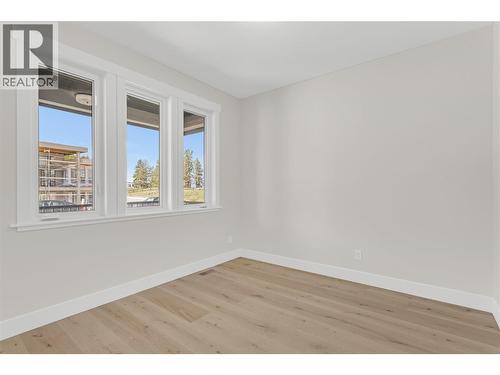 Main Floor Bedroom #2 - 2150 Montenegro Drive, Kelowna, BC - Indoor Photo Showing Other Room