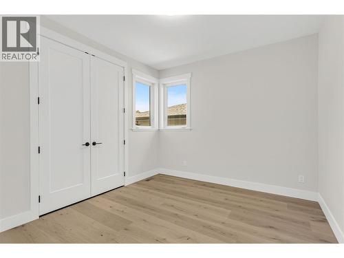 Main Floor Bedroom #3 - 2150 Montenegro Drive, Kelowna, BC - Indoor Photo Showing Other Room
