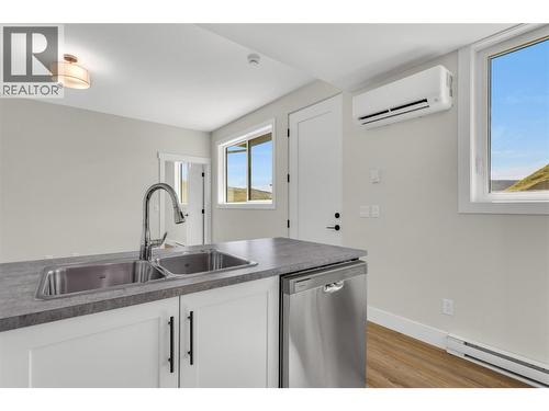 2150 Montenegro Drive, Kelowna, BC - Indoor Photo Showing Kitchen With Double Sink