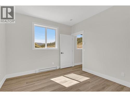 Legal Suite Bedroom - 2150 Montenegro Drive, Kelowna, BC - Indoor Photo Showing Other Room