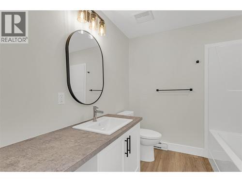 Legal Suite Bathroom - 2150 Montenegro Drive, Kelowna, BC - Indoor Photo Showing Bathroom