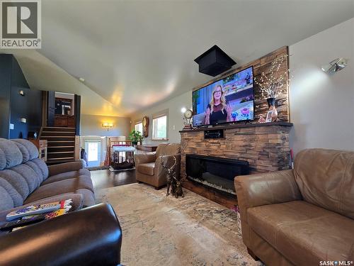 43 Assiniboia Avenue, Mctaggart, SK - Indoor Photo Showing Living Room With Fireplace