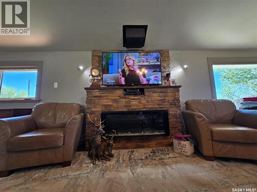 43 Assiniboia Avenue, Mctaggart, SK - Indoor Photo Showing Living Room With Fireplace