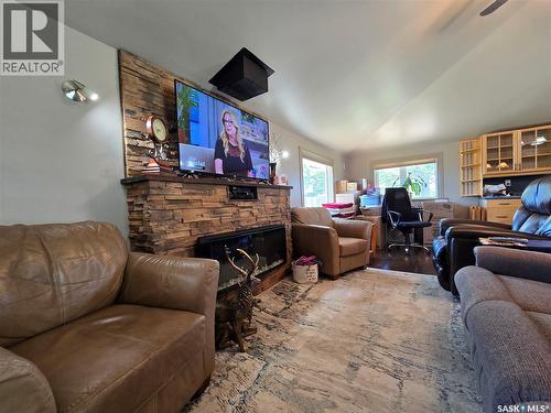 43 Assiniboia Avenue, Mctaggart, SK - Indoor Photo Showing Living Room With Fireplace