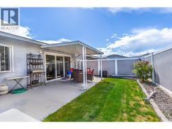 Easy access from the main living area to the fully fenced backyard, perfect for pets and outdoor enjoyment. - 