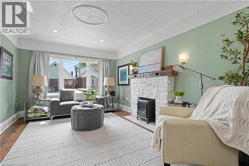 34 Weir Street S, Hamilton, ON - Indoor Photo Showing Living Room With Fireplace