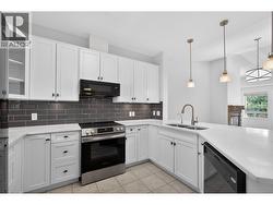 Open concept layout with a large counter space suitable for bar seats - 