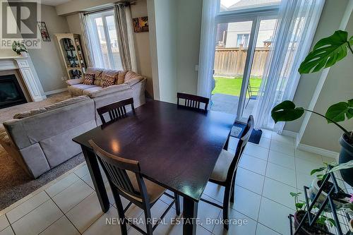 40 Fairgrounds Drive, Hamilton, ON - Indoor Photo Showing Dining Room With Fireplace