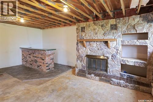 333 Dominion Bay, Central Butte, SK - Indoor Photo Showing Basement With Fireplace
