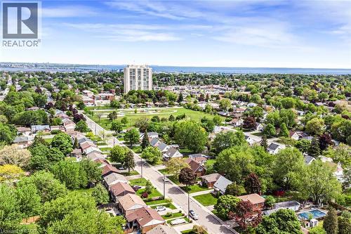 Aerial perspective showcasing residential streets lined with established homes and mature trees - 435 East 36Th Street, Hamilton, ON - Outdoor With View