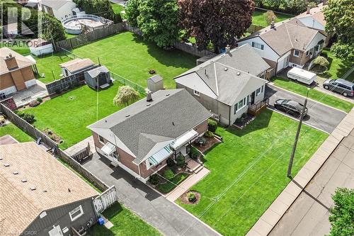 Property featuring a brick exterior and sloped roofline - 435 East 36Th Street, Hamilton, ON - Outdoor