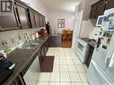 2 544 Circlebrooke Drive, Yorkton, SK  - Indoor Photo Showing Kitchen With Double Sink 