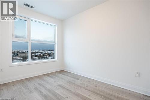 Expansive window offering broad natural illumination and neighborhood views - 1936 Rymal Road E Unit# 512, Hamilton, ON - Indoor Photo Showing Other Room