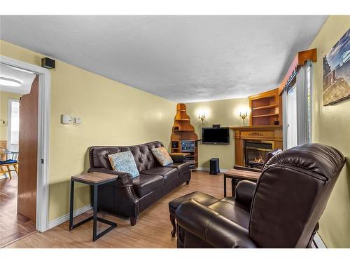 9 Gushue'S Road, Conception Harbour, NL - Indoor Photo Showing Living Room With Fireplace