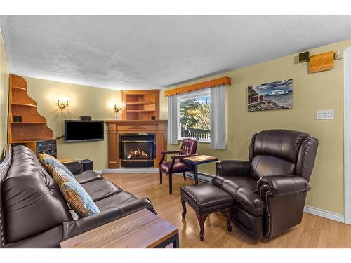 9 Gushue'S Road, Conception Harbour, NL - Indoor Photo Showing Living Room With Fireplace