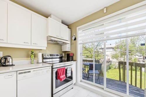 Cuisine - 3239 Rue Miquelon, Brossard, QC - Indoor Photo Showing Kitchen