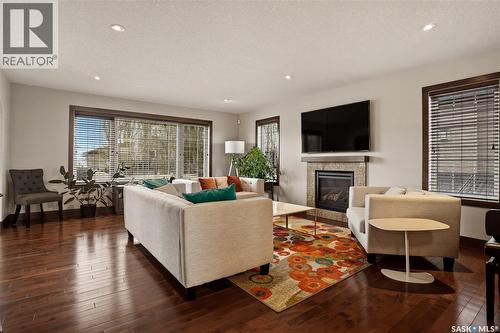 8034 Fairways West Drive, Regina, SK - Indoor Photo Showing Living Room With Fireplace