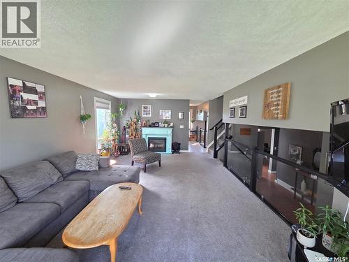 204 1St Street E, Carlyle, SK - Indoor Photo Showing Living Room With Fireplace