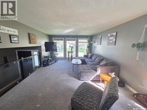 204 1St Street E, Carlyle, SK - Indoor Photo Showing Living Room With Fireplace