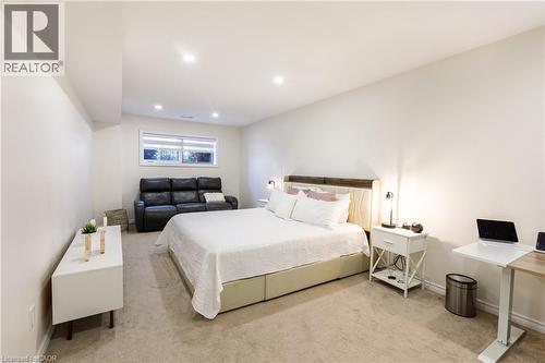 Spacious room featuring neutral carpeting and recessed lighting - 10 Redbud Crescent, Simcoe, ON - Indoor Photo Showing Bedroom