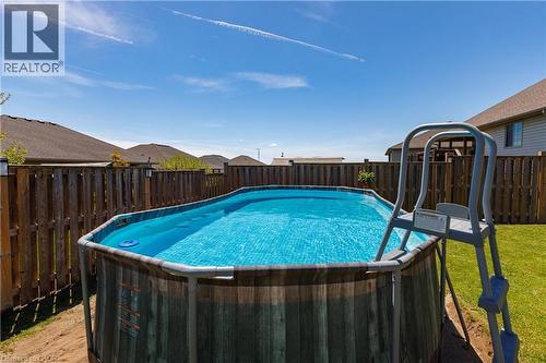 10 Redbud Crescent, Simcoe, ON - Outdoor With Above Ground Pool