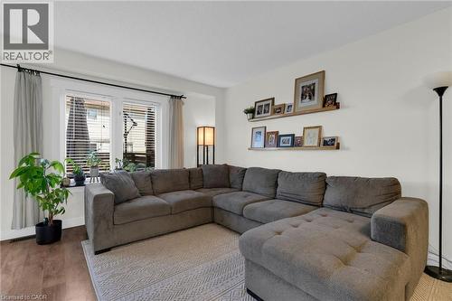 Living Room opens up to the Dining and Kitchen Area - 4 Parkside Crescent, Angus, ON - Indoor Photo Showing Living Room