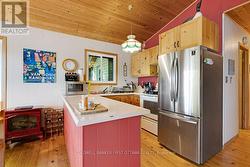 Samsung 2023 refrigerator; 5-burner Jenn Air stove - 