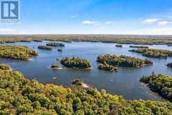 Cottage has 1.3 private acres & 210 ft waterfront - 