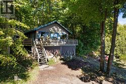 Under the deck is extra storage & workshop area - 