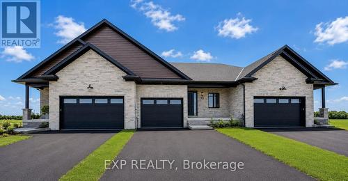 101 Bedell Drive, Mapleton, ON - Outdoor With Facade