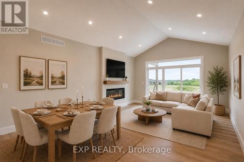 Virtually staged for illustrative purposes - 101 Bedell Drive, Mapleton, ON - Indoor With Fireplace