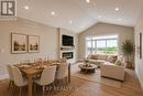Virtually staged for illustrative purposes - 101 Bedell Drive, Mapleton, ON  - Indoor With Fireplace 