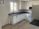 349 X Avenue S, Saskatoon, SK  - Indoor Photo Showing Kitchen With Double Sink 