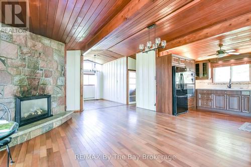 22 Talon Trail, Tiny, ON - Indoor Photo Showing Living Room With Fireplace