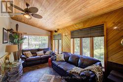Sunroom with in-floor heat and wood burning stove - 