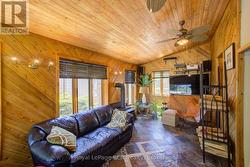 Sunroom with in-floor heat and wood burning stove - 